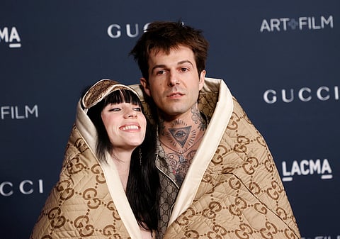 Michael Tran/Agence
France-Presse
Billie Eilish and Jesse Rutherford draped in a Gucci blanket.