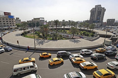 This picture shows Baghdad's Tahrir square, where the city's main boulevards on the eastern bank of the Tigris river converge at a roundabout built in 1937, on November 7, 2022. - Once the epicentre of the October 2019 nationwide anti-government protest movement, the square is now transformed. More than 600 people were killed and thousands injured during the unprecedented protests, where demonstrators denounced corruption and the "negligence" of politicians, as well as the "control" of neighbouring Iran on their country. Photo by AHMAD AL-RUBAYE / AFP
