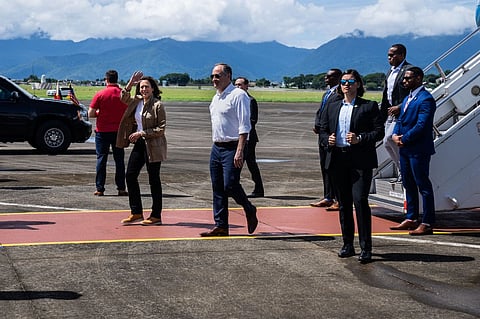 US Vice President Kamala Harris arrive at Puerto Princesa International Airport before visiting a local village in Palawan on 22 November. Photo by Haiyun Jiang / POOL / AFP