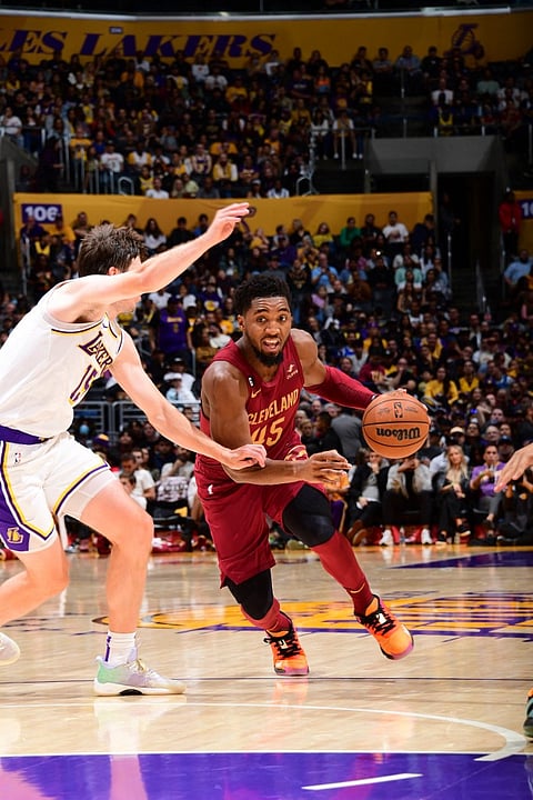 Donovan Mitchell fires 33 points to lead the Cleveland Cavaliers to a 114-100 win over the Los Angeles Lakers. Photo by Adam Pantozzi / NBAE / Getty Images / Getty Images via AFP