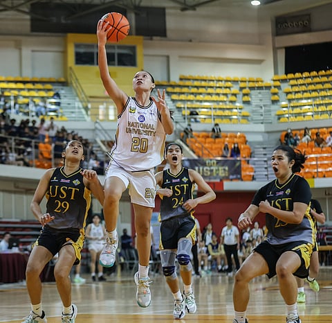 UST's Tacky Tacatac and NU's Gypsy Canuto battle for the loose ball during the UAAP Season 85 women's basketball round 2 match a the UST Quadricentennial Pavilion, November 19, 2022. Photo by Rio Deluvio