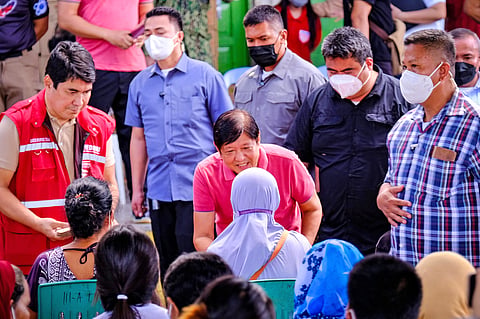 President Ferdinand Marcos Jr. leads the distribution of relief goods to victims of storm ‘Paeng’ at the Broce Central Elementary School of Peace in Datu Odin Sinsuat, Maguindanao on Tuesday. Joining the President are Gov. Mariam Mangudadatu, Special Assistant to the President Anton Lagdameo, Social Welfare and Development Secretary Erwin Tulfo, Mayor Lester Sinsuat, and Vice Mayor Sajid Sinsuat. | Photograph by Yummie Dingding PPA POOL