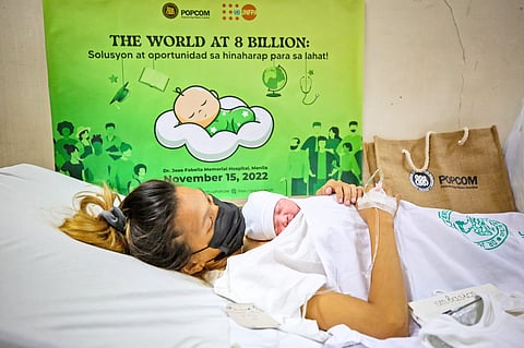 Lucky eighth billionth Representatives from the Commission on Population and Development and nurses welcome baby Vinice as the symbolic eight billionth baby whose mother Margarita Villorente gave birth at the Dr. Jose Fabella Memorial Hospital in Manila past Tuesday midnight. | Photograph by Yummie Dingding for the daily tribune @tribunephl_yumi