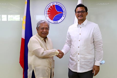 New Land Transportation Office chief Jose Arturo “Jay Art” Tugade (right) with Department of Transportation Secretary Jaime Bautista