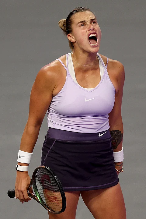 MATTHEW STOCKMAN/AGENCE FRANCE-PRESSE
ARYNA Sabalenka celebrates after beating Ons Jabeur in the round-robin play of the WTA Finals.