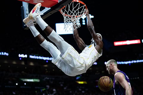 Jimmy Butler puts on a show as the Miami Heat posted a 117-112 overtime win over the Charlotte Hornets in the NBA. | LAUREN SOPOURN/AGENCE FRANCE-PRESSE