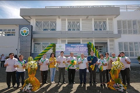 PAGCOR key officers led by VP for Corporate Social Responsibility Group Ramon Stephen Villaflor (sixth from right), AVP for Community Relations and Services Eric Balcos (fifth from right) and AVP for
Corporate Communications Carmelita Valdez (fourth from right) join Lingayen local officials, Mayor Leopoldo Bataoil (sixth from left) and Vice Mayor Mac Dexter Malicdem (fifth from left) during the inauguration of the new Multi-Purpose Evacuation Center in Barangay Pangapisan. (Photo courtesy of PAGCOR)