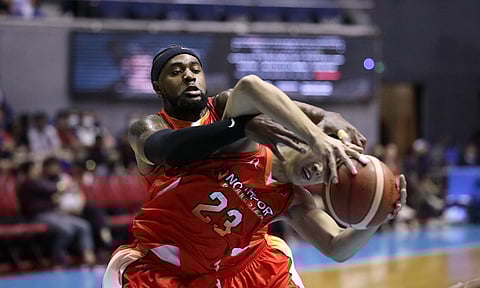 William Navarro and Prince Ibeh of NorthPort pull down the rebound during their PBA Commissioner’s Cup game against Converge. The Batang Pier won, 112-97. | PHOTOGRAPH COURTESY OF PBA