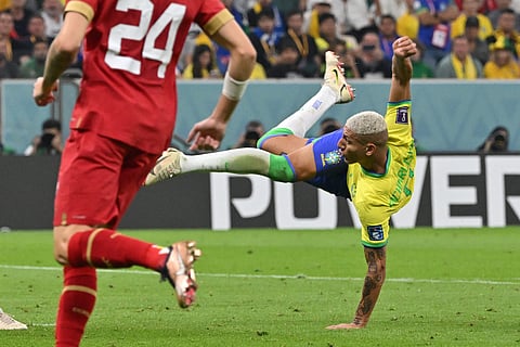 RICHARLISON delivers an acrobatic goal that lifted Brazil to a 2-0 win over Serbia in the group stage of the World Cup. | NELSON MEIDA/agence
france-presse