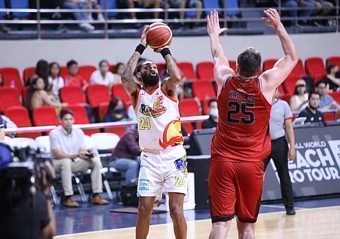 Ryan Pearson of Rain or Shine shoots a jumper against Cameron Krutwig of Blackwater in their PBA Commissioner’s Cup game yesterday at the Philsports in Pasig. | Photograph COURTESY OF PBA