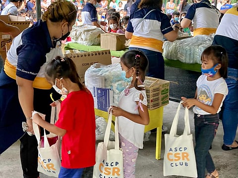 School supplies distribution at Pundquit Elemntary School in San Antonio, Zambales. | PHOTOGRAPHS COURTESY OF SUN LIFE