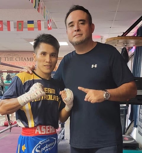 PHOTOGRAPH COURTESY OF Memo Heredia
Vincent Astrolabio gets taken under the wings of physical fitness expert Memo Heredia in Las Vegas.