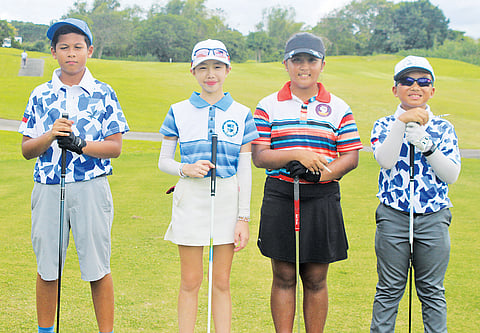 Photograph courtesy of Eurika Bolivar
LEADERS in the middle school individual divisions in the Interschools golf team championships organized by the Junior Golf Foundation of the Philippines. From left: John Majgen Luis Gomez of Ateneo, Nicole Gan of Immaculate Conception Academy, Precious Zaragosa of Learning Links Academy and Race Phoenix Manhit of Ateneo.