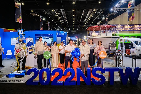 President Ferdinand R. Marcos Jr. (left foreground) and DoST Secretary Renato Solidum (right) open the National Science and Technology Week celebration at the World Trade Center, Pasay City yesterday. At the background are (left to right): Philippine Council for Health Research and Development Executive Director Jaime C. Montoya; Food and Nutrition Research Institute Imelda Angeles-Agdeppa; DoST Assistant Secretary Diana L. Ignacio; Undersecretary for Research and Development Leah J. Buendia; DoST Undersecretary for Regional Operations Sancho A. Mabborang; Undersecretary for Scientific and Technical Services Maridon O. Sahagun; and Pasay City Mayor Imelda Calixto-Rubiano.