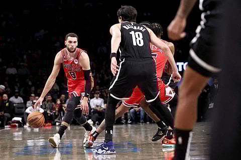 NEW YORK, NEW YORK - NOVEMBER 01: Zach LaVine #8 of the Chicago Bulls is guarded by Yuta Watanabe #18 of the Brooklyn Nets during the second quarter of the game at Barclays Center on November 01, 2022 in New York City. NOTE TO USER: User expressly acknowledges and agrees that, by downloading and or using this photograph, User is consenting to the terms and conditions of the Getty Images License Agreement. Dustin Satloff/Getty Images/AFP (Photo by Dustin Satloff / GETTY IMAGES NORTH AMERICA / Getty Images via AFP)