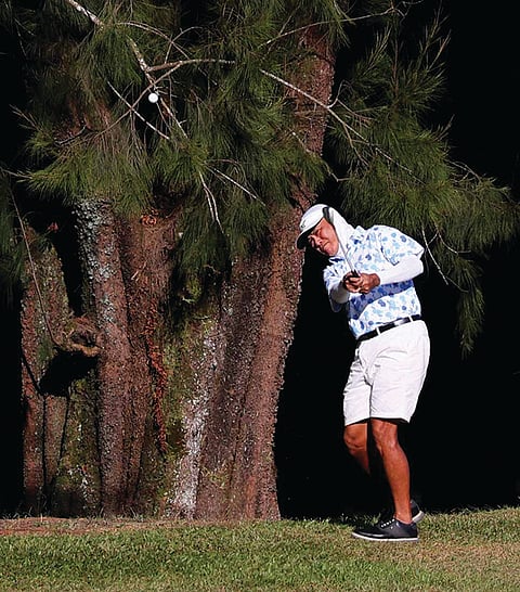 Photograph by Rio Deluvio for the Daily Tribune @tribunephl_rio
Junjun Plana hits his second shot on the par-5 16th hole during the 72nd Fil-Am Men’s Invitational golf team tournament at the Camp John Hay Golf Club in Baguio City.