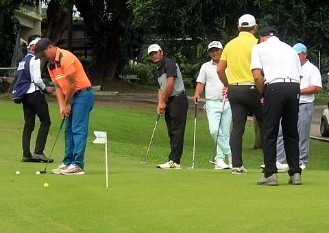 (FILE PHOTO) Players warm up before the start of the ICTSI Villamor Match Play at the Villamor Airbase Golf Course in Pasay City.