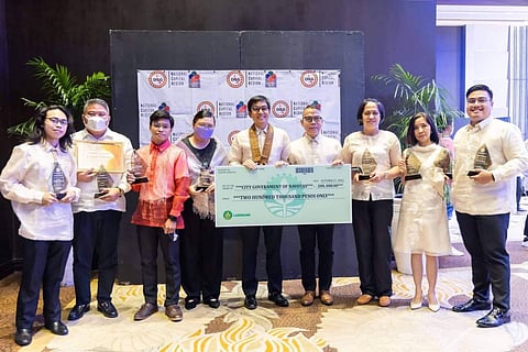 FROM left: Lord Azrin Bacalla, 3rd place, Search for the Best Digital IEC on Promoting Healthy and Drug-free Lifestyle for the Youth; Dr. Vonne Villanueva, special assistant, Navotas Anti-Drug Abuse Council chair and Disaster Risk Reduction and Management officer; Ronnie Buan, 3rd place, Search for the Best Digital IEC on Promoting Healthy and Drug-free Lifestyle for the Youth; Cheney Gabriel, City Agriculture Office head; Navotas Mayor John Rey Tiangco; Engr. Rufino M. Serrano, City Planning and Development officer; Engr. Janice Lacsamana, City Environment and Natural Resources Office head; Jenifer G. Galorport, Navotas DILG OIC director; and Engr. Isaiah Jaye Gimpaya, City Engineering Office head