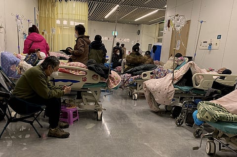 This picture shows Covid-19 patients on beds at Tianjin Nankai Hospital in Tianjin on December 28, 2022. Photo by Noel Celis / AFP