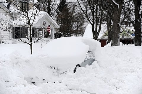 Buffalo -- a city in Erie County that is no stranger to foul winter weather -- is the epicenter of the crisis, buried under staggering amounts of snow. (Photo by John Normile / GETTY IMAGES NORTH AMERICA / Getty Images via AFP)