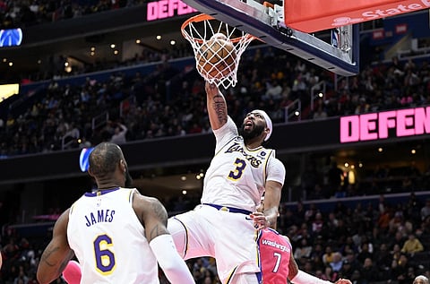 Anthony Davis of the Los Angeles Lakers dunks the ball in the fourth quarter of the game against the Washington Wizards. Photo by Greg Fiume / GETTY IMAGES NORTH AMERICA / Getty Images via AFP