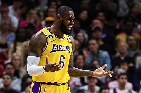 LeBron James of the Los Angeles Lakers reacts during the third quarter against the Miami Heat at FTX Arena on December 28, 2022 in Miami, Florida. Photo by Megan Briggs / GETTY IMAGES NORTH AMERICA / Getty Images via AFP