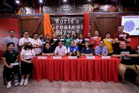 (From left) Mr. Jorge Concepcion, SPAVI General Manager; Mr. Vincent Gregorio, SPAVI President and CEO; Dr. Adrian Paolo Laurel, ACES President and COO; Patricia Hizon, Plus Networl General Manager; and Oli Sicam, SPAVI Marketing Head with the 18 participating schools and their checks from the Shaeky's Super League Bundle during the Shakey's Super League Thanksgiving at Shakey's Magallanes in Makati. Photo by Rio Deluvio