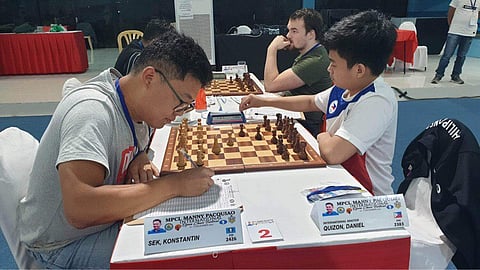RUSSIAN Konstantin Sek (left) makes his move against Filipino IM Daniel Quizon during their MCPL Manny Pacquiao International Open Chess Festival in General Santos City. Photo courtesy of MCPL