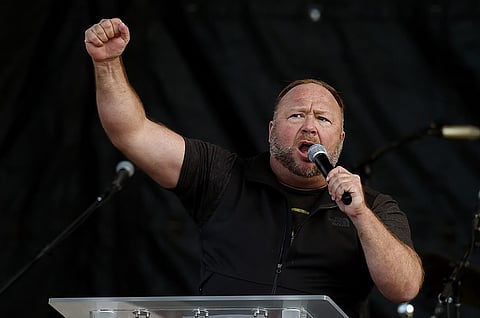 US far-right radio show Alex Jones has been ordered to pay nearly $1.5 billion to the families of victims of the Sandy Hook school shooting,
after falsely claiming for years that the 2012 massacre was a hoax. (Photo by Olivier DOULIERY / AFP)