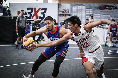 PHOTOGRAPH COURTESY OF PBA
CHESTER Saldua of Cavitex attacks the defense of Yutien Andrada of Platinum Karaoke during their PBA 3x3 Second Conference Leg 5 finals. The Braves won, 21-13.