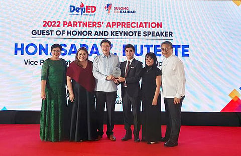 DepEd Undersecretary for Legislative Affairs and Partnerships Atty. Gerard Chan (third from left) hands over a plaque of appreciation to CitySavings, led by Salary Loans Business Head Julian Aboitiz (third from right). Also present: DepEd External Partnerships Director Edel Carag (left), CitySavings Reputation and Brand Management Head Paula Ruelan (second from left), Branch Operations Group Head Linda Flor Hortezano (second from right), and External Relations Head Atty. Roel Eric Garcia (right). | PHOTOGRAPHs COURTESY OF CITYSAVINGS