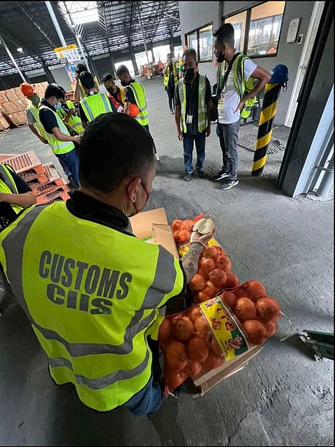 The shipments were declared to contain udon noodles and frozen dim sum balls, but the Customs Intelligence and Investigation Service at MICP found them to have undeclared fresh red and white onions, frozen ox tripe, frozen barbecue, and frozen craw fish. (Photo courtesy of Bureau of Customs)