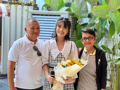 Mona Gonzales with her parents. | PHOTOGRAPH COURTESY OF KIRSTEN OBRERO