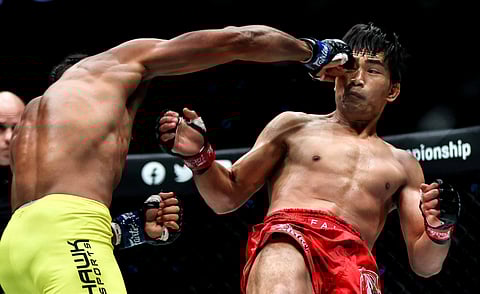 EDSON Marques connects a powerful right hook that sent Eduard Folayang crashing during their lightweight division battle in ONE Fight NIght 5 at the Mall of Asia Arena. | Photograph by Rio deluvio for the daily tribune @tribunephl_rio