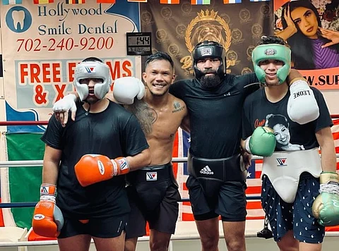 PHOTOGRAPH COURTESY OF Eumir Marcial/IG
Eumir Marcial (second from left) loads up in his sparring session by banging with three fighters from three different weight classes.