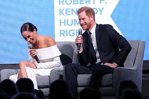 Meghan, Duchess of Sussex, and Prince Harry, Duke of Sussex, speak onstage at the 2022 Robert F. Kennedy Human Rights Ripple of Hope Gala at New York Hilton on 6 December 2022 in New York City. (Photo by Mike Coppola / GETTY IMAGES NORTH AMERICA / Getty Images via AFP)