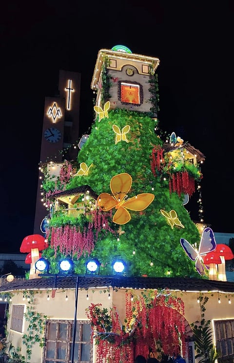 THIS giant Christmas tree in Antipolo, Rizal adorns the Sumulong Park in front of the Antipolo Cathedral. It has become a tourist attraction because of its butterfly haven underneath.
