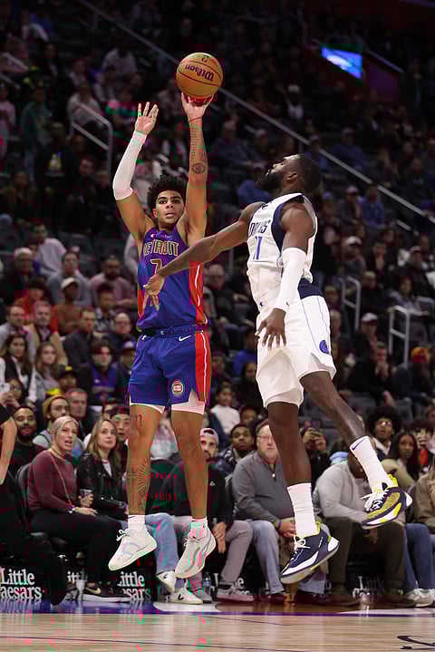 Killian Hayes of the Detroit Piston lights up the scoreboard against the Dallas Mavericks in NBA action yesterday. Detroit won, 131-125, in overtime. | GREGORY SHAMUS/AGENCE FRANCE-PRESSE