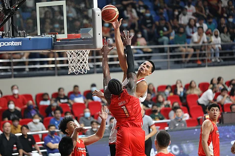 JAPETH Aguilar of Ginebra soars for a dunk over Prince Ibeh of NorthPort during their PBA Commissioner’s Cup game yesterday at the Philsports Arena yesterday, The Kings won, 99-93. | PHOTOGRAPH COURTESY OF PBA