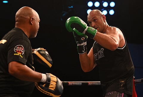 TYSON Fury credits his newfound power to his trainer, SugarHill Steward. | BEN STANSALL/AGENCE FRANCE-PRESSE