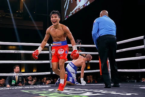 PHOTOGRAPH COURTESY
OF Esther Linn/Showtime
Vincent Astrolabio sends Russian Nikolai Potapov down in their world bantamweight title eliminator yesterday in Las Vegas. Astrolabio won by sixth-round knockout.