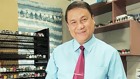 Anthony de Leon shows one of his creations.