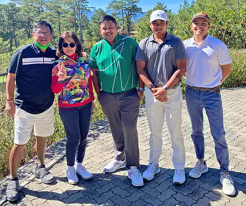 THE family plays golf together. From left: Father Charlie, mother Claire, brothers James, Charles, and Carl.