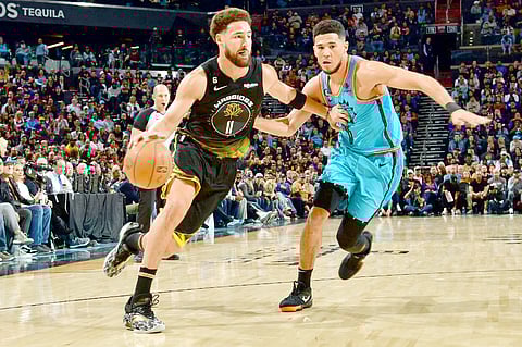 Warriors cool off red-hot Celtics