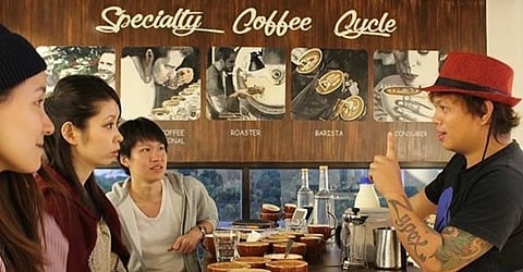 Coffee connoisseur Mark Niel Madrelejos teaches the youth on the art of coffee. | Photograph courtesy of iWanna