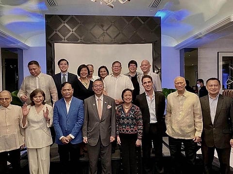 PHOTOGRAPH COURTESY OF THE MAGSAYSAY FAMILY
The Magsaysays with the Ramon Magasaysay Awards laureates: (Foreground) Mila Magsaysay Valenzuela, (second from left), Ramon Magsaysay Jr. (second from right); (back, from left) Paco Magsaysay, Jaime Magsaysay, Pam Mallari Magsaysay, Michael Magsaysay Valenzuela (sixth from left), and Dr. Rafael Magsaysay Valenzuela (rightmost).