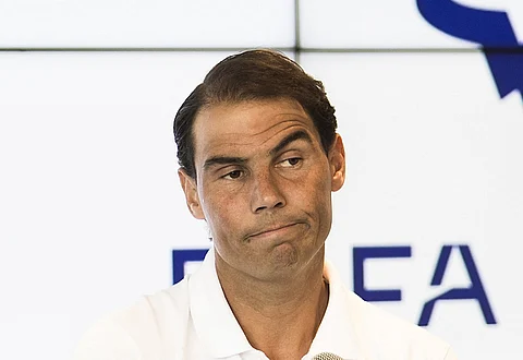 Spanish tennis player Rafael Nadal talks during a press conference to announce he will not compete in the French Open.