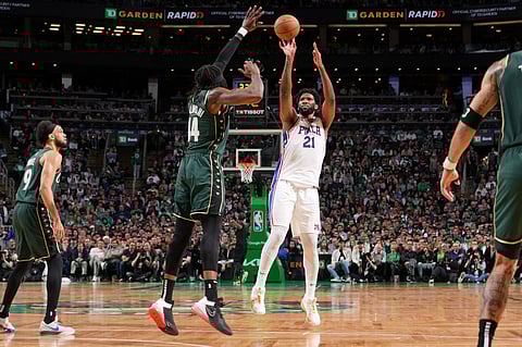 Joel Embiid #21 of the Philadelphia 76ers shoots a three point basket during the game against the Boston Celtics during Game 5 of the 2023 NBA Playoffs Eastern Conference semi-finals on May 9, 2023 at the TD Garden in Boston, Massachusetts. Photo by Jesse D. Garrabrant / NBAE / Getty Images / Getty Images via AFP