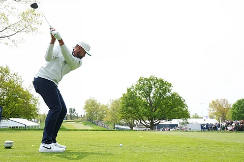 Tony Finau of the United States plays his shot from the 14th tee during a practice round prior to the 2023 PGA Championship at Oak Hill Country Club on 16 May 2023 in Rochester, New York.