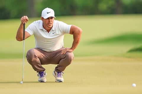 Brooks Koepka of The United States lines up a putt on the 17th hole during the final round of the 2023 PGA Championship at Oak Hill Country Club on 21 May 2023 in Rochester, New York. (Photo by David Cannon/Getty Images) (Photo by DAVID CANNON / David Cannon Collection / Getty Images via AFP)